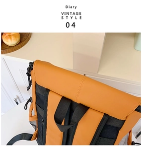 Détail du sac à dos vintage grande capacité avec contraste de couleurs orange et noir chic
