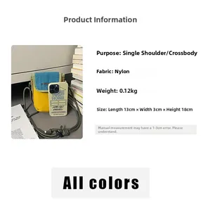 Compact nylon crossbody phone bag in blue and yellow showing size with smartphone