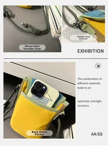 Detail view of colorful crossbody phone bag featuring woven strap and metal D-ring buckle