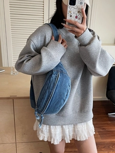 Blue denim crossbody chest bag in crescent shape for women with retro washed finish