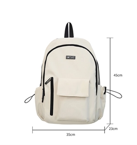 Detail of a cream canvas backpack showing 45cm height, black zippers, and water bottle pocket