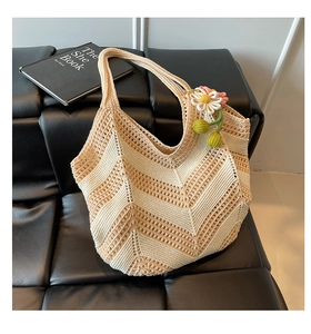 Detailed V-shaped wavy knit texture and daisy flower charm on cream woven tote bag