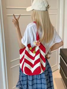 Red and white crochet woven tote bag with 3D flower accents and chevron wave pattern
