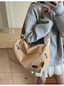Khaki nylon crossbody bag with BNT logo embroidery and adjustable wide shoulder strap