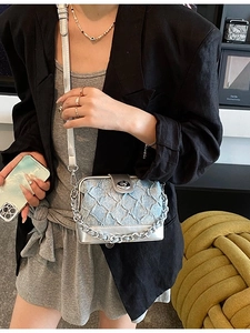 Fashionable denim and silver leather crossbody bag with chain and metal clasp