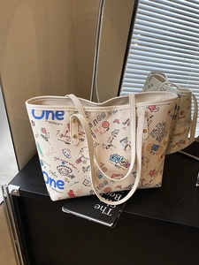 Grand sac cabas en toile beige avec imprimé graffiti coloré et fines bandoulières