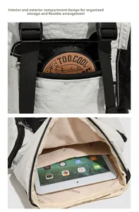 Detail view of the waterproof nylon backpack interior with tablet and cosmetics storage