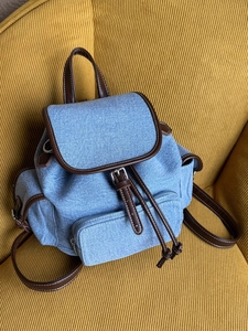 Large capacity vintage denim backpack with brown leather trim and adjustable straps