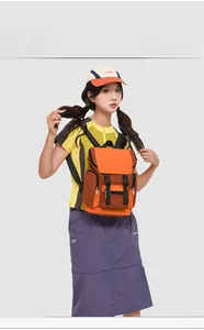 Detail view of the multi-pocket structure and buckle closure on the outdoor backpack
