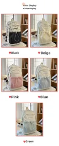 Detail showcasing five color options of this multi-pocket school backpack with panda charms