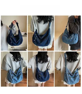 Detail view of retro denim crossbody tote bag showing front zipper pocket and strap