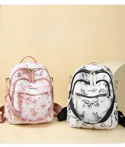 Détails de sacs à dos élégants avec motifs de papillons roses et noirs pour le voyage