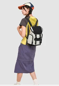 Close-up of contrast color nylon backpack featuring durable flip-top and buckle closure