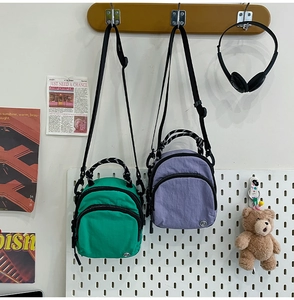 Détails de mini sacs en nylon imperméable vert et violet avec poignées tissées
