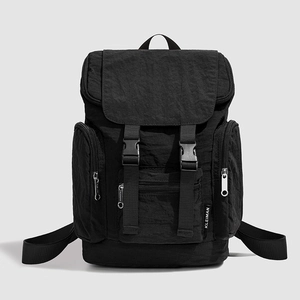 Front view of black nylon utility backpack with multiple pockets and secure buckle flap