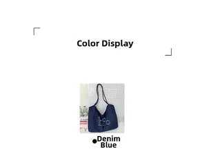 Detail view of denim blue tote bag showing durable fabric and white embroidered logo