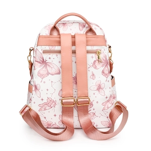 Détail du sac à dos blanc avec motifs papillons et poche arrière antivol