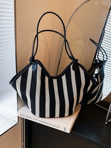 French chic black and white striped woven tote bag with slim black leather shoulder straps