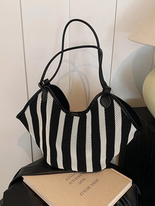 Striped woven tote bag in black and white mesh with long leather shoulder straps