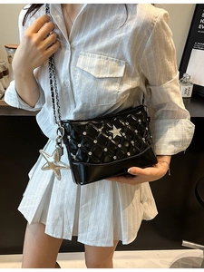 Quilted black chain crossbody bag with star charms and glossy finish for women