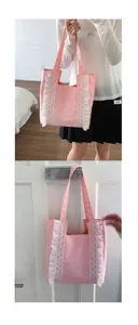 Close-up of pink canvas tote bag featuring decorative white lace ruffles and handles