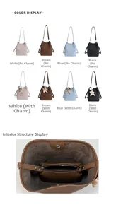 Detail view of colorful bucket bags with plush charms and internal zipper pouch