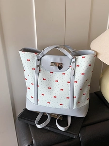 Floral print tote bag with red bows and heart pendant for casual daily commute