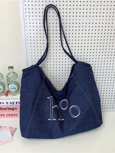 Classic deep blue denim tote bag with white embroidery and long shoulder straps