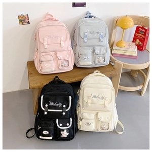 Sacs à dos scolaires grande capacité en quatre coloris avec poches multifonctions
