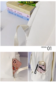 Détails des bretelles renforcées et de la poche latérale cachée sur le sac à dos blanc