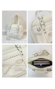 Detail view of cream tote bag showing hardware, bow design and spacious interior