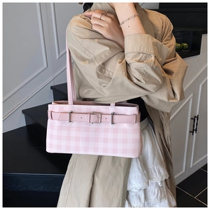 Pink and white checkered shoulder bag with stylish leather strap and silver buckle detail