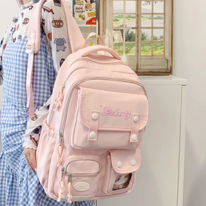 Sac à dos étudiant rose avec plusieurs poches, larges bretelles et compartiments utiles