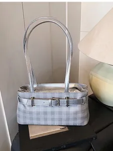 Silver-grey checkered underarm bag with double straps and metallic buckle accent