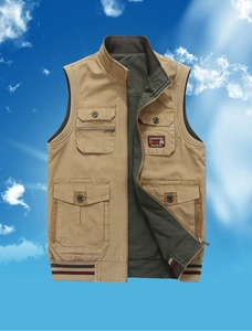 Detail of khaki outdoor tactical vest featuring functional pockets and stand-up collar