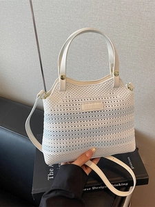 Knitted bucket bag with blue stripes and leather strap for women in cream white