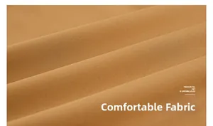 Gros plan sur la texture du tissu marron camel à séchage rapide et tissage respirant