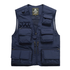 Macro detail of multi-pocket outdoor vest featuring functional zippers and D-ring