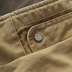 Men's reversible khaki outdoor vest with corduroy collar and vintage metal button detail