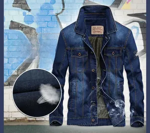 Detail of dark blue denim jacket featuring breathable fabric and stand collar