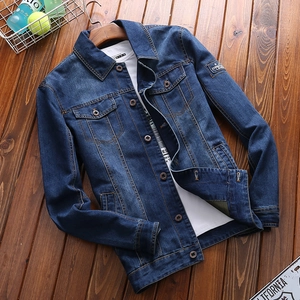 Classic dark blue washed denim jacket with cowboy embroidery and front chest pockets