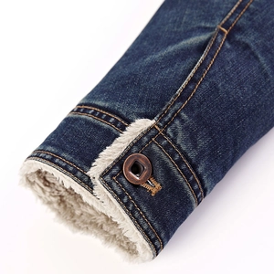 Men's dark blue denim jacket with thick white fleece lining and vintage copper button details