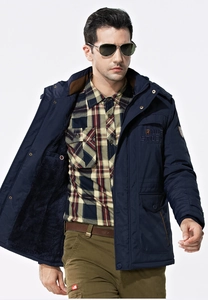 Close-up of men's navy blue hooded parka featuring large pockets and rib-knit cuffs