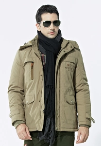 Detail of khaki men's parka showing chest embroidery and heavy thermal material texture