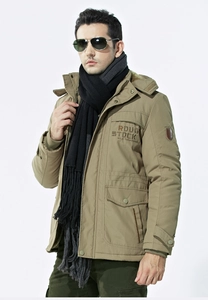 Detail of khaki men's winter parka with embroidered lettering and windproof fabric texture