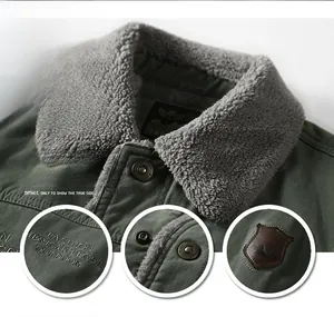 Detail view of military green jacket showing plush fur collar and brand logo patches
