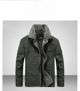 Detailed macro view of heavy fleece lining and durable canvas texture on men's cargo jacket