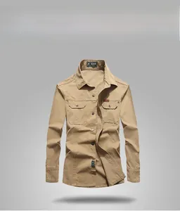 Detail view of khaki long-sleeve cotton shirt with double chest utility pockets