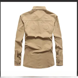 Rear view of khaki cotton long sleeve shirt showing back yoke and buttoned cuffs