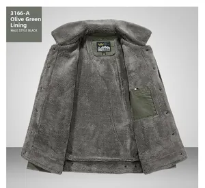 Detail of army green winter jacket showing warm thick grey faux fur lining and inner pocket